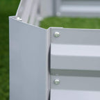 Grey metal planter bed corner joint with two fastening screws