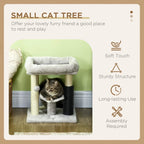 Grey cat tree with cushioned top bed, lower perch, and dark grey scratching posts for play.