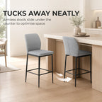 Grey velvet bar stool with backrest and footrest, black metal frame