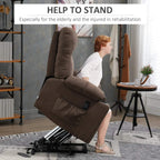 Dark brown power lift recliner chair lifted and partially reclined, footrest extended.