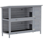 Grey rabbit hutch with two wire cages and double doors, elevated frame