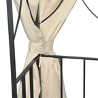 Beige side curtain tied at a black metal frame corner inside the gazebo tent