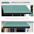 Dark green retractable awning canopy with scalloped valance mounted above a doorway.
