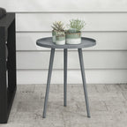 Grey round side table with circular top and tapered steel legs, clean modern design