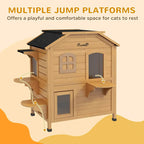 Outdoor wooden 2-story cat house with multiple jump platforms and front window and door openings