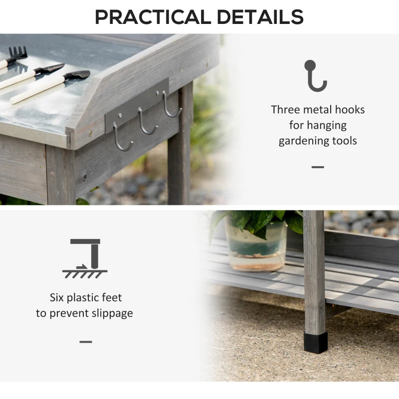 Grey potting table with three metal hooks on side rail and slatted feet