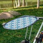 Blue patterned canopy with front support poles on kids tricycle