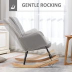 Light grey sherpa-look rocking chair with wingback arms and curved wood rockers