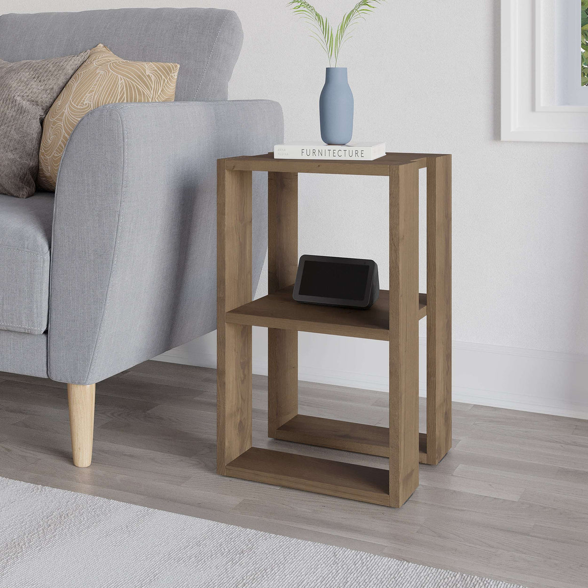 Light oak bedside table with open front shelves and rectangular wood frame