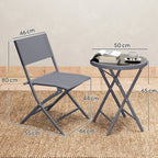Grey folding chairs and round glass-top bistro table shown with size measurements