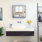 Grey wall mirror cabinet above bathroom sink with reflective double doors