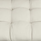 Cream white upholstered cushion backrest panel with tufted quilted stitching