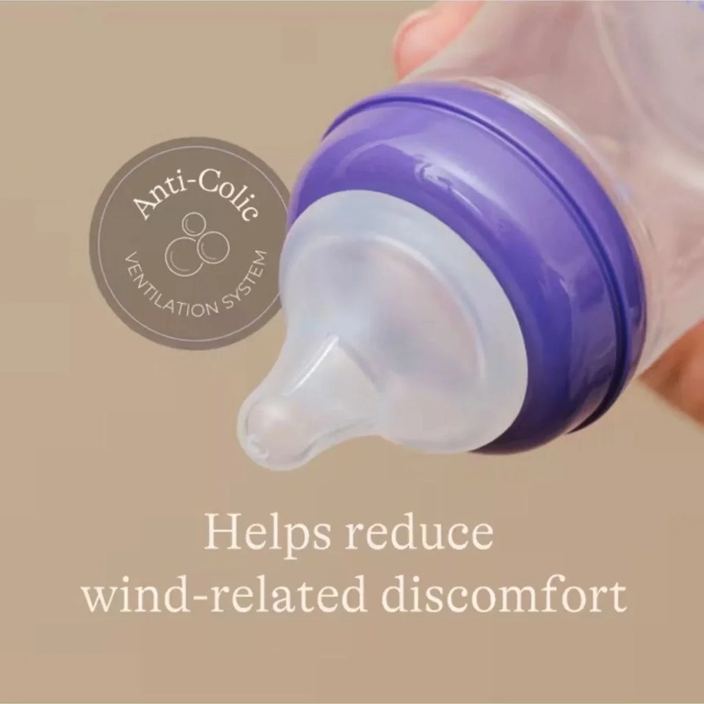 NaturalWave feeding bottle teat close-up with purple anti-colic vented collar