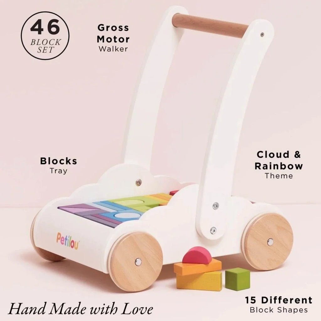 White block walker with wooden wheels and tray holding colorful stacking blocks
