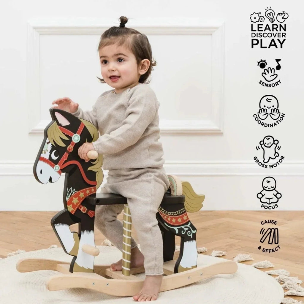 Painted wooden rocking horse with carved head and wooden rockers