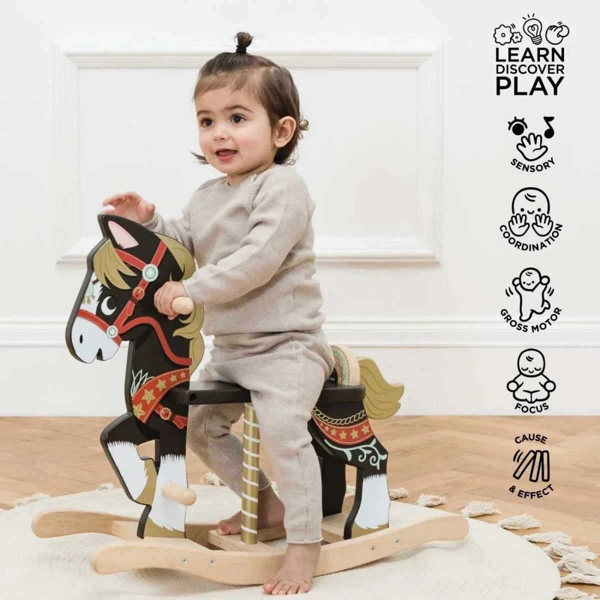Painted wooden rocking horse with carved head and wooden rockers
