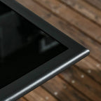 Black tempered glass table top edge with smooth metal frame