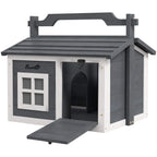 Portable grey rabbit hutch with open entry door and front ramp, white side trim