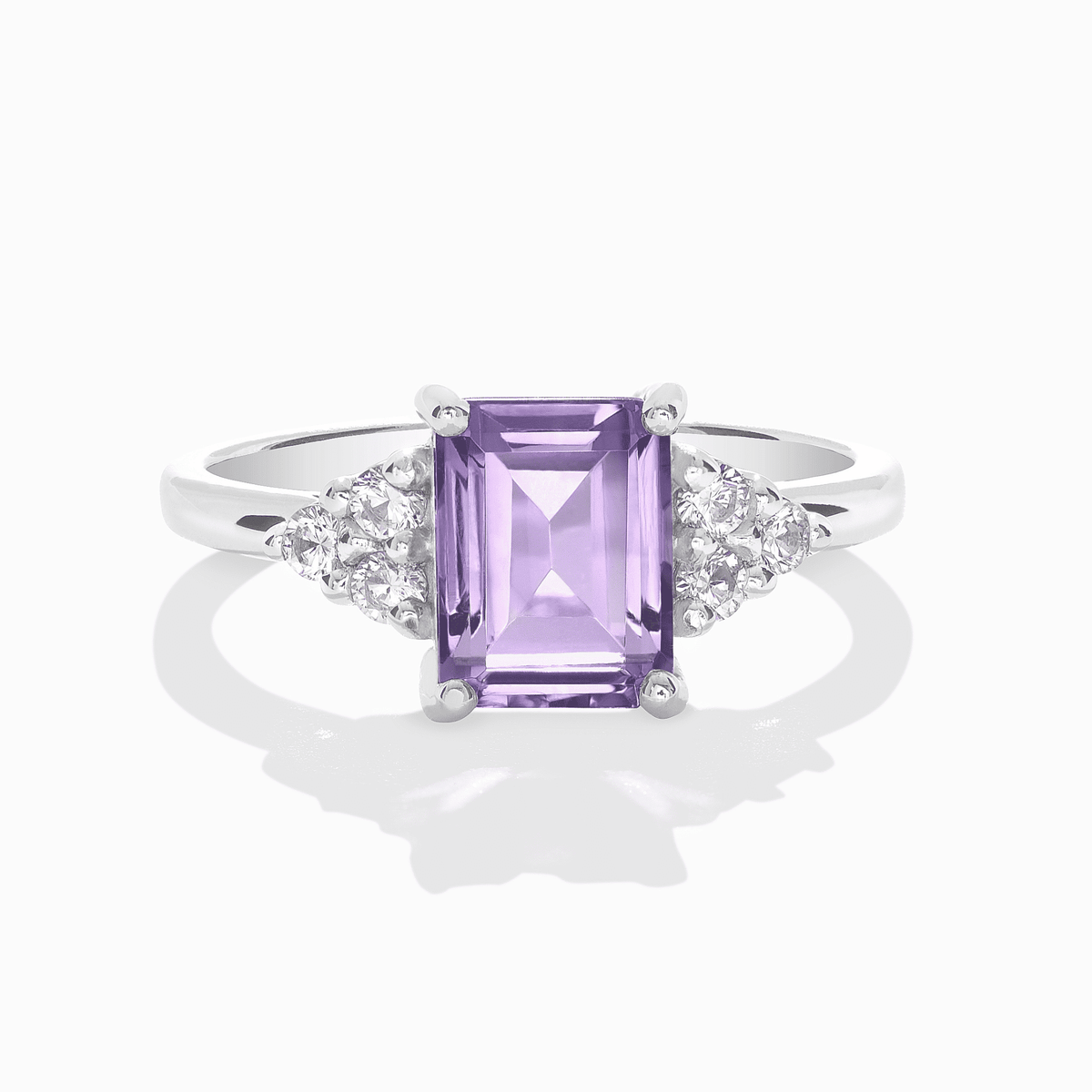 Sterling silver ring with lavender emerald-cut amethyst center and round side stones