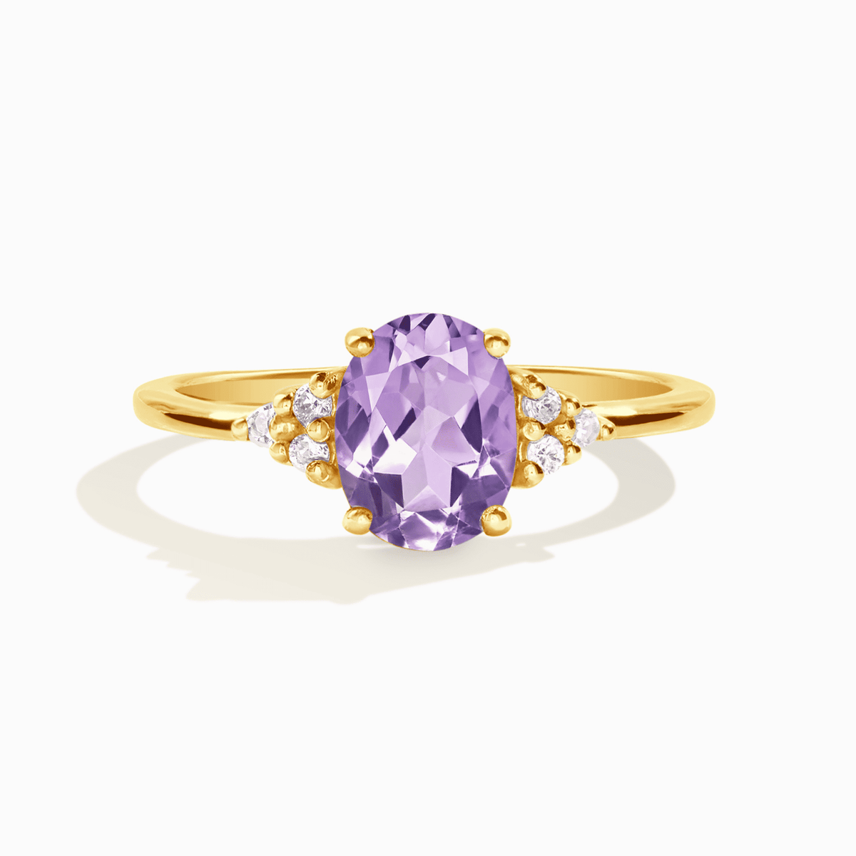 Lavender amethyst ring in gold vermeil with oval center stone and side accents