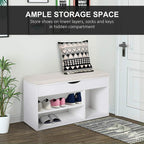 White shoe cabinet bench with padded top, open cubbies, and lower shoe storage