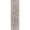 Geometric rug panel with maze-like curving lines in white, black, and olive tones