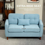 Light blue fabric two-seat sofa with tufted back panels and wide seat