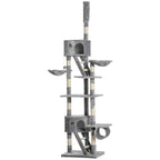 Light grey floor-to-ceiling cat tree tower with platforms, ramp steps, and hanging-style perch