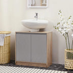 Bathroom storage cabinet with two grey doors, oak sides, and decorative panel design
