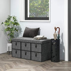 Dark grey shoe storage bench with six fabric drawers and padded top seat