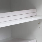 White internal shelf surface in a printer cabinet with support pegs