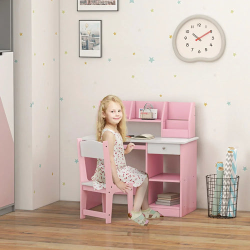 Pink kids desk with open storage cubbies and matching chair, shown with a child
