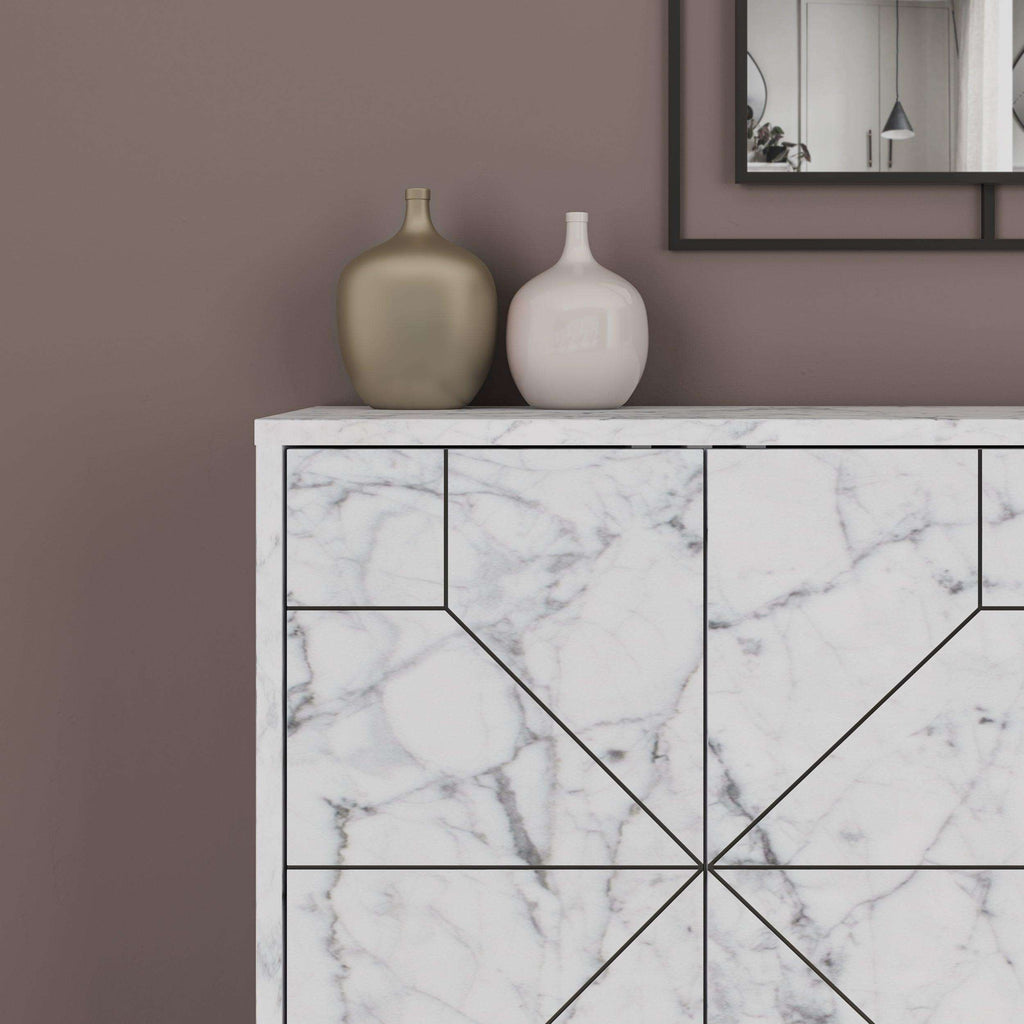 White marble-look sideboard front with geometric panel doors and veining