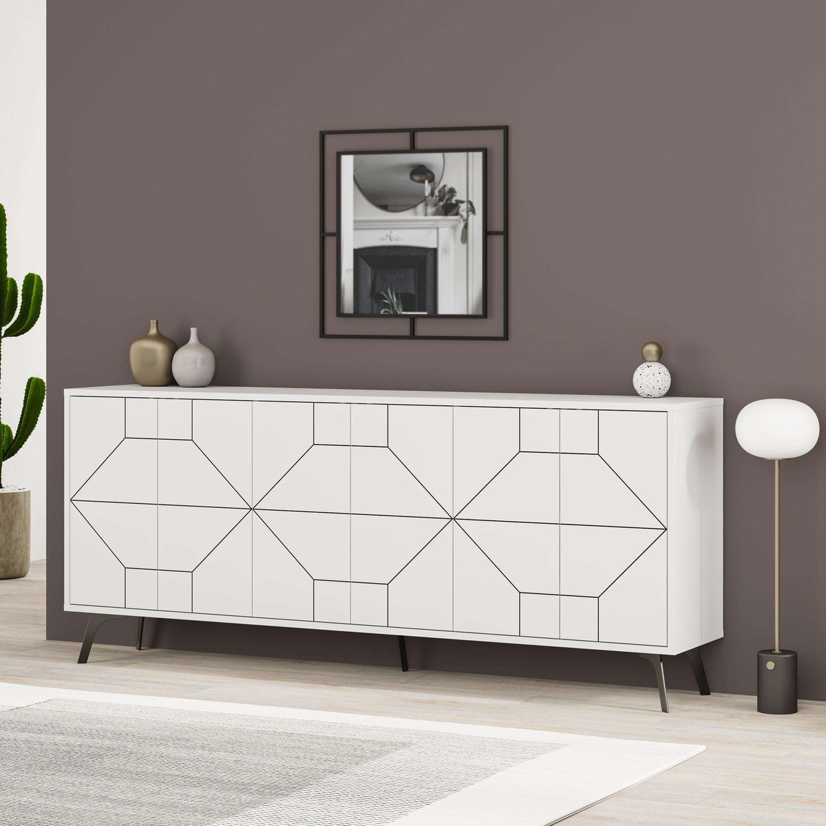 Console sideboard with geometric front panels, white finish, tapered metal legs.