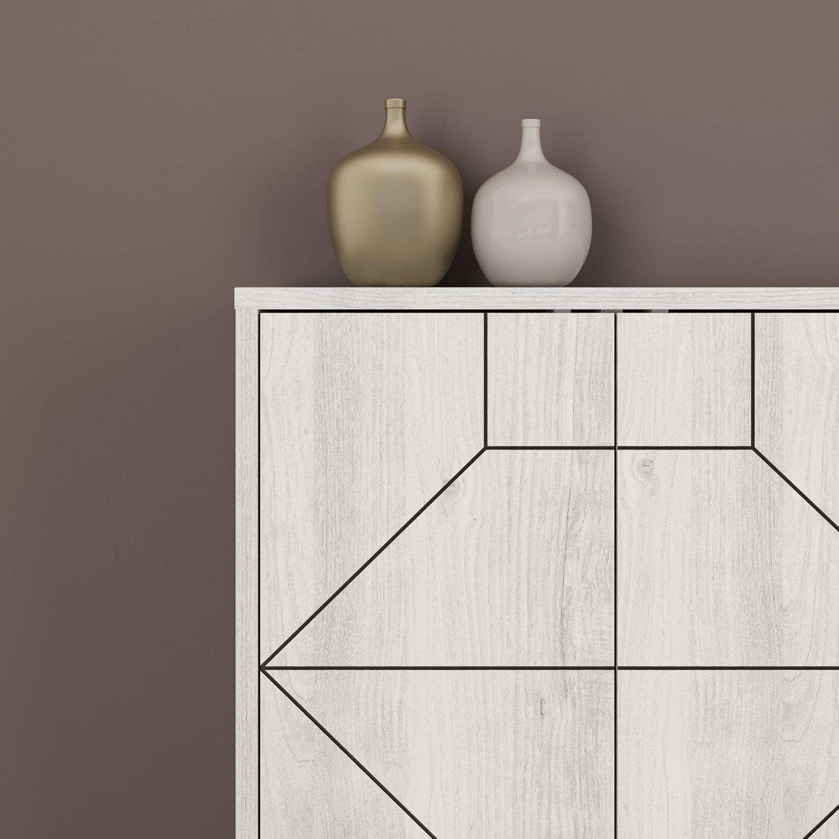 White marble-effect console sideboard close-up with geometric front panels