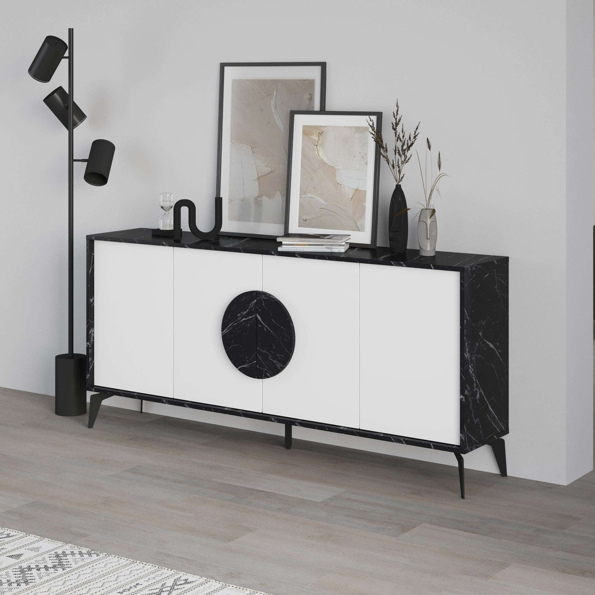 White console sideboard with black marble-look ends and dark circular door handle