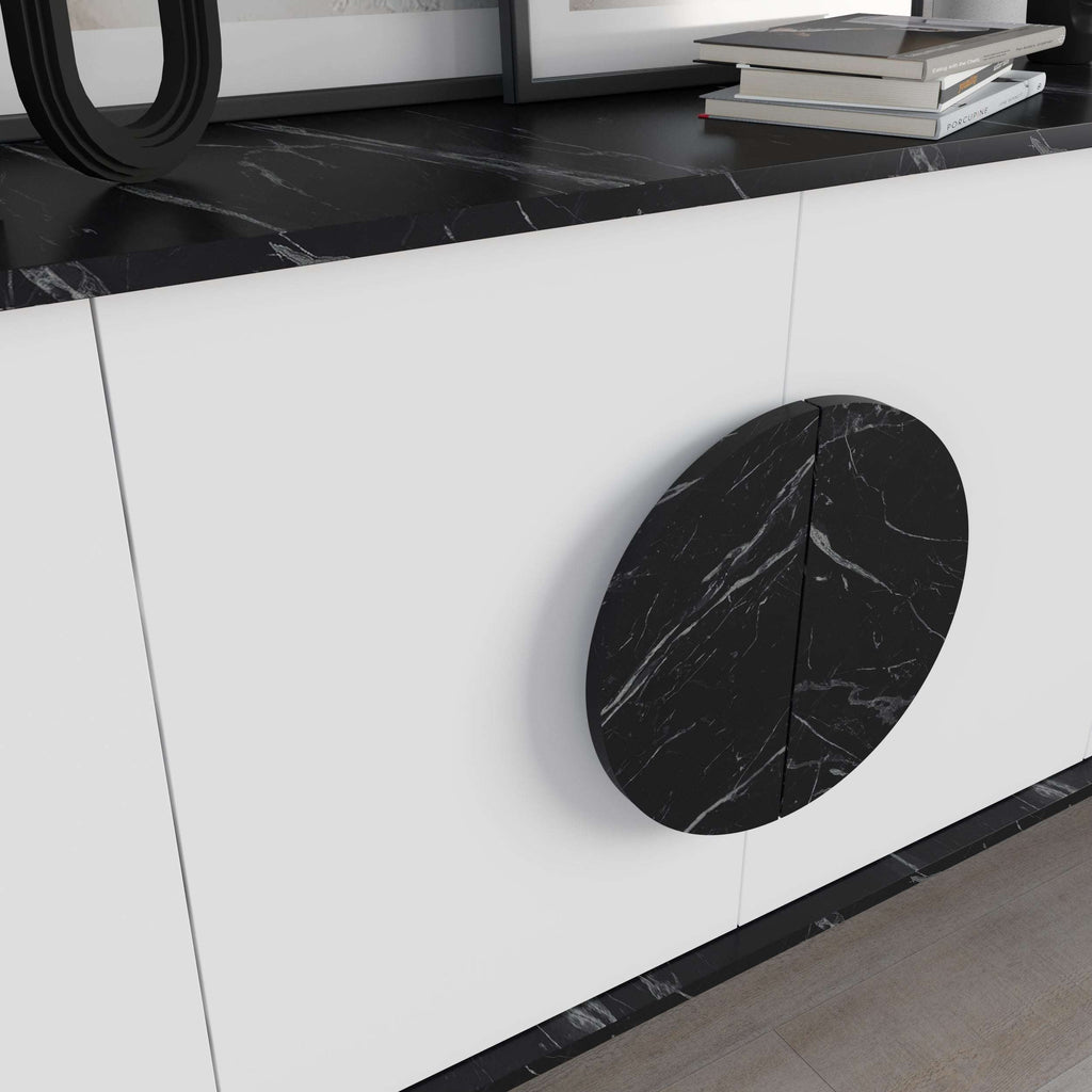 White cabinet panel with large circular cut-out detail and black marble-look insert