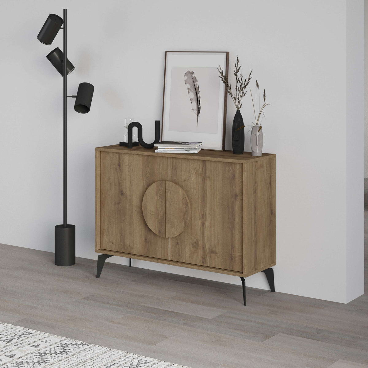 Modern sideboard display unit with light oak finish and circular door detail