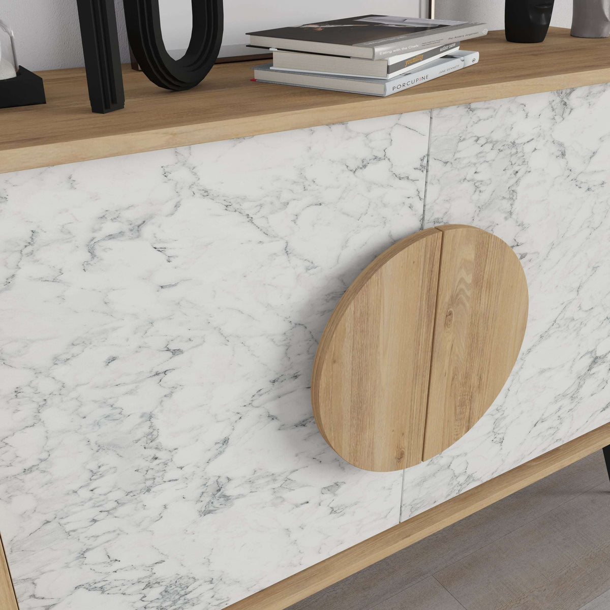 Modern console sideboard cabinet corner with white marble-look top and round oak door panel