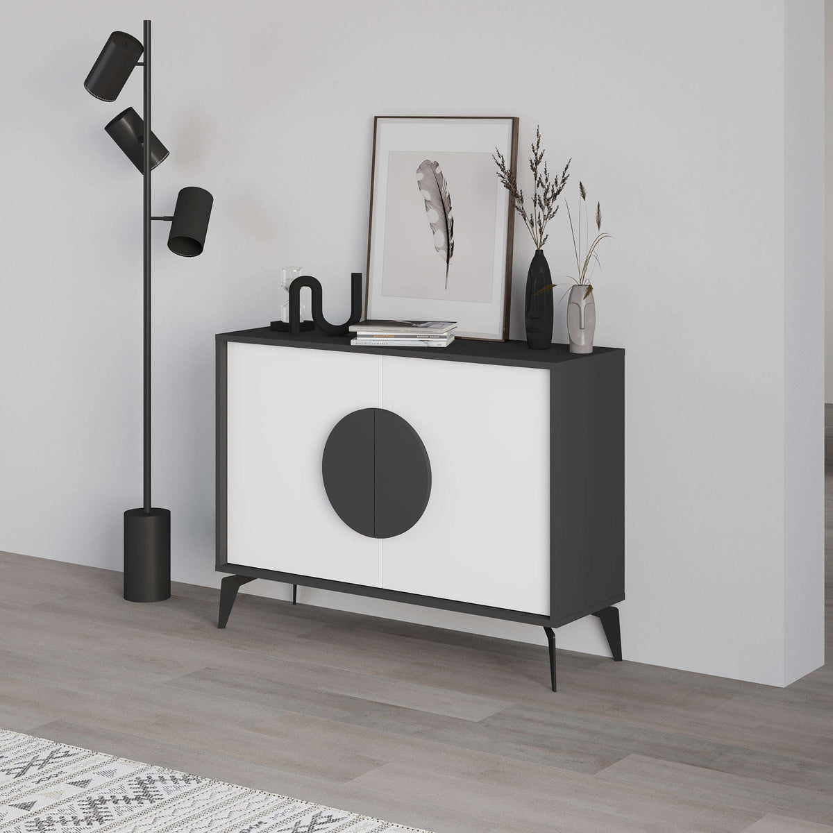 Modern sideboard cabinet with dark frame, white doors, and large circular handle