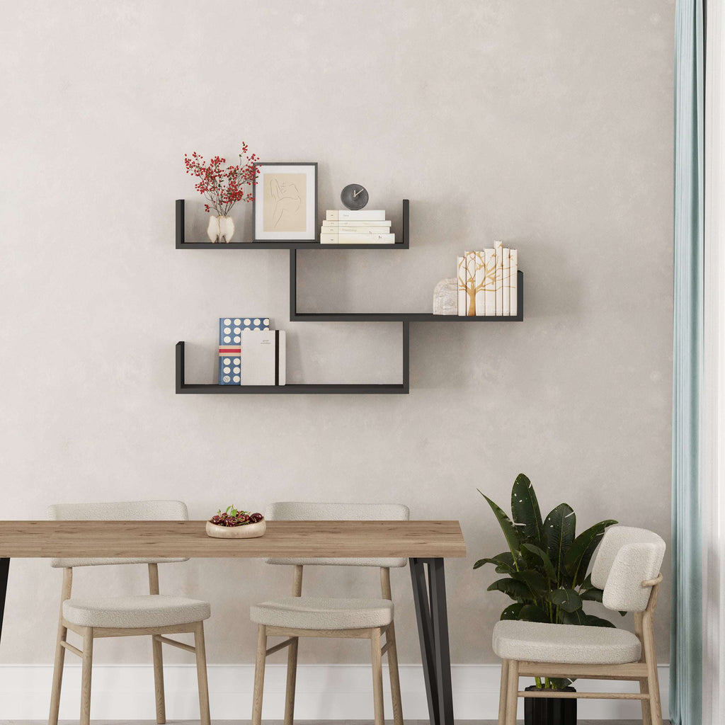 Black floating wall shelf unit with three open compartments