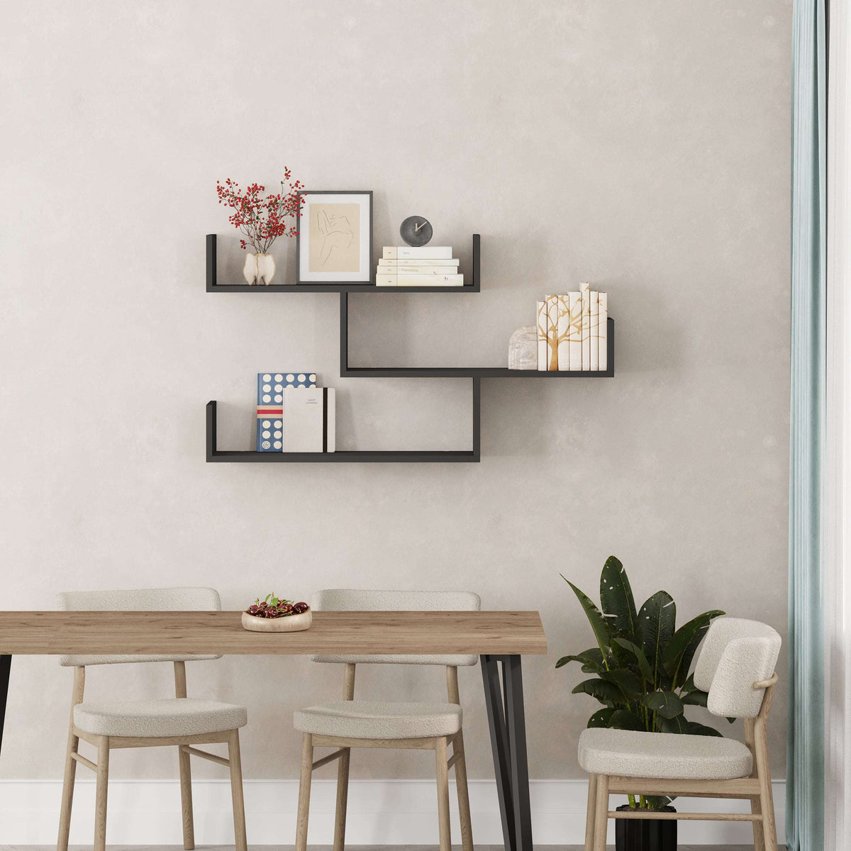 Black floating wall shelf unit with three open compartments