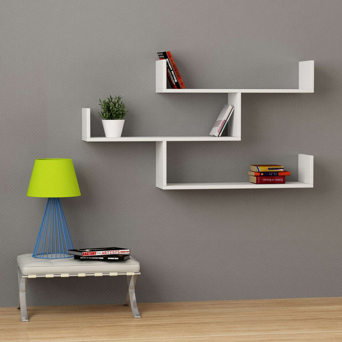 White floating wall bookcase shelf unit with three open compartments and vertical frame