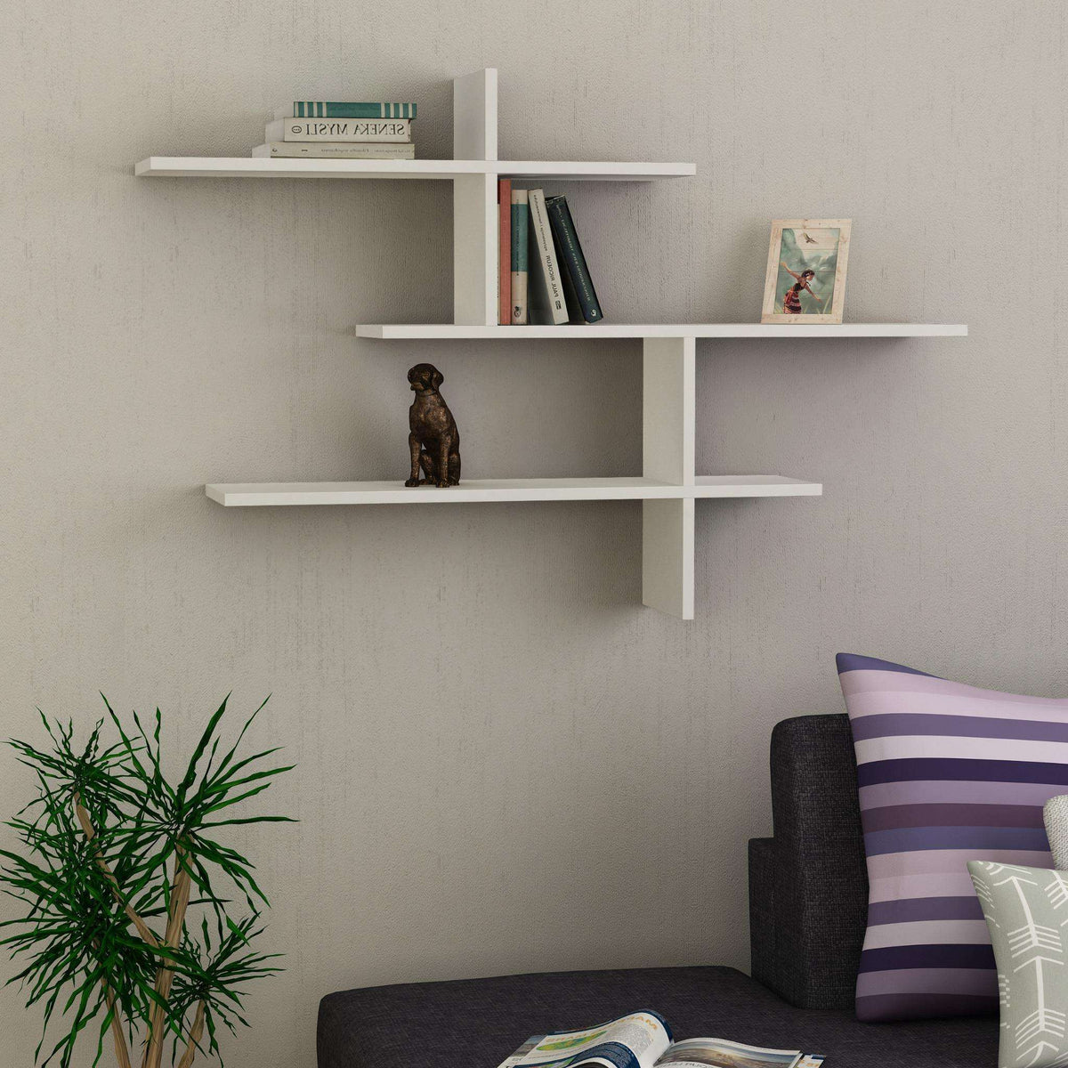 White floating wall shelf with three horizontal compartments and a central vertical support
