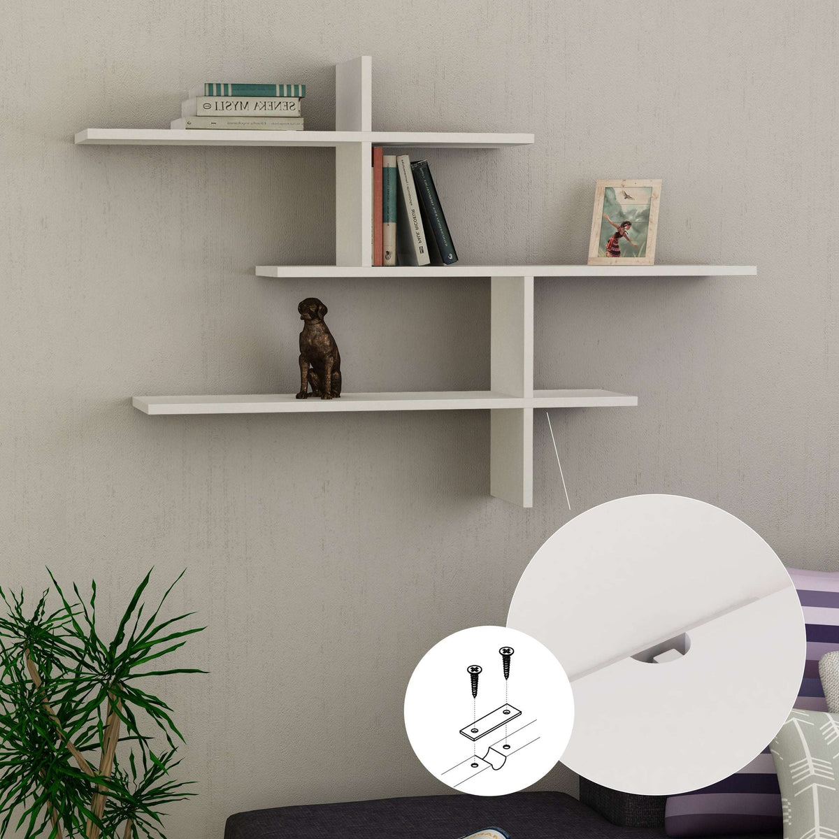 White floating wall shelf with three tiers and side cutout bracket detail