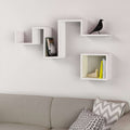 White floating wall shelf with three open compartments and modern stepped design