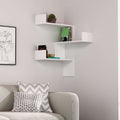 Wall-mounted corner bookcase with white floating shelves and open cubby storage