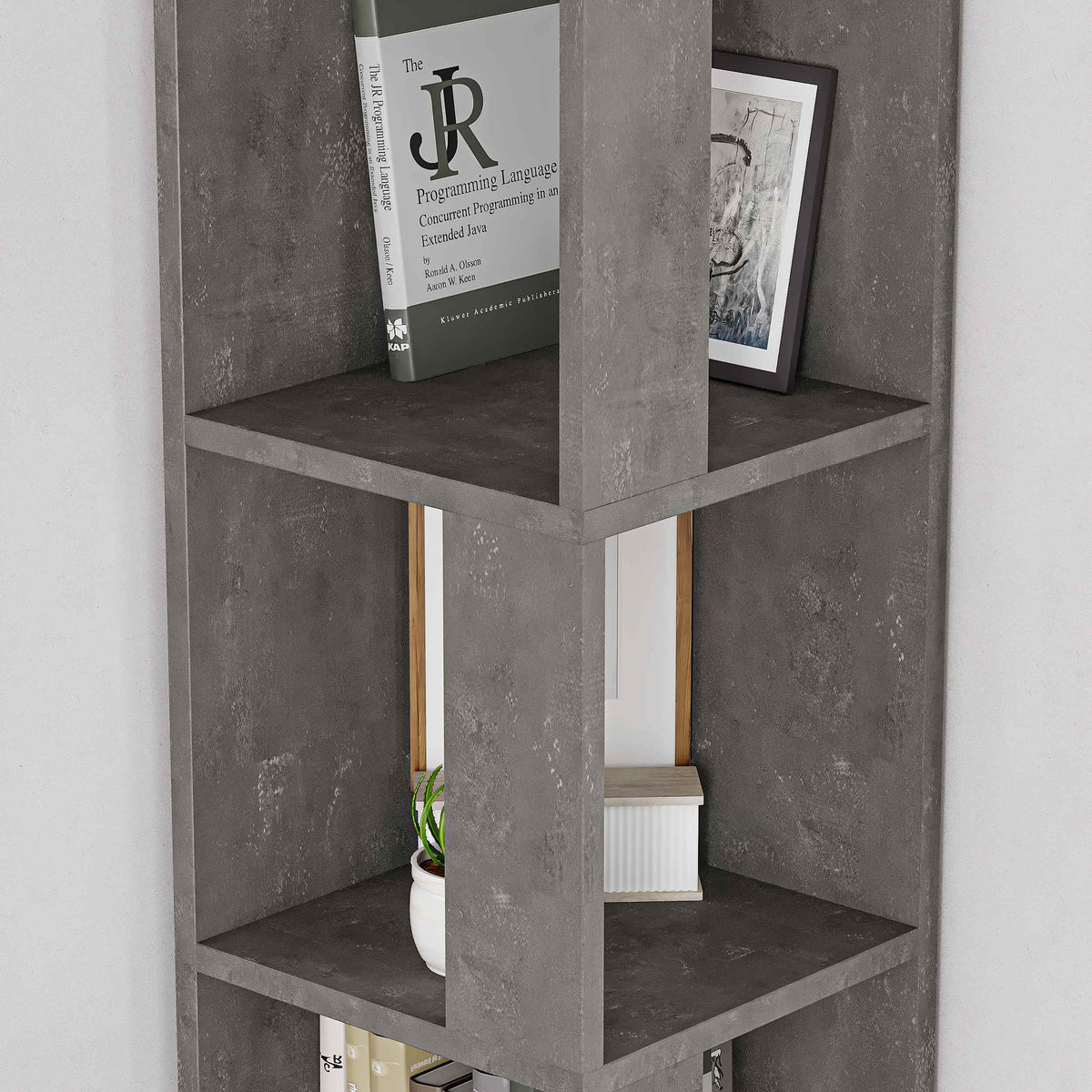 Tall corner bookcase with open shelves and grey concrete-look panels