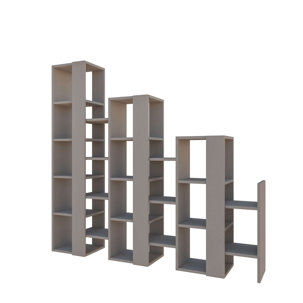 Grey modular bookcase room divider with open cubby shelves and stepped layout
