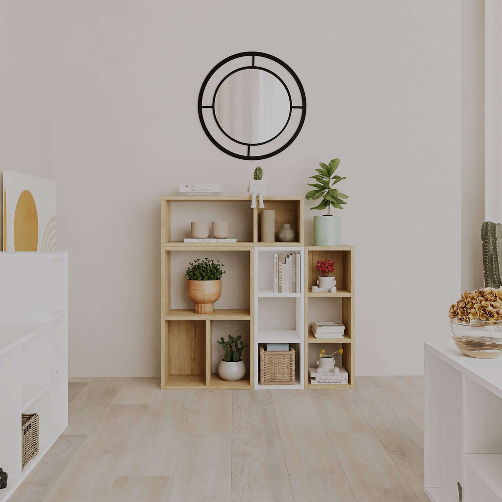 Light wood modular bookcase with open square shelves and cubby storage compartments
